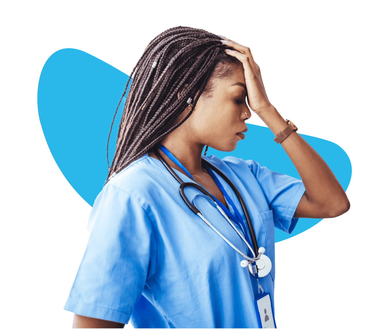 Side profile of a healthcare provider who is holding her head in her hand